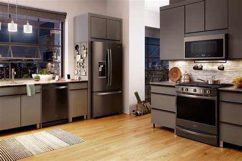 kitchen with black cabinets and stainless steel appliances|kitchen countertops with black appliances.